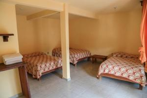 Кровать или кровати в номере Hotel Santa Rita