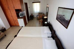 Voodi või voodid majutusasutuse Hotel Melikari toas