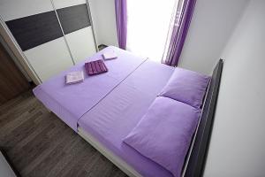 Voodi või voodid majutusasutuse Apartment Mario toas