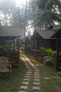 Zahrada ubytování Palolem Luxuries Beach Cottages