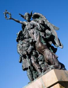 a statue of a woman and a man with a spear at Skye View in Glenelg