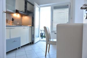 Kuchyň nebo kuchyňský kout v ubytování Promenada apartmani