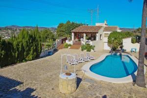 Der Swimmingpool an oder in der Nähe von El Ventorrillo - holiday home with stunning views and private pool in Benissa