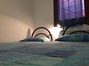 Posteľ alebo postele v izbe v ubytovaní Holiday home in Rosolina Mare 26701