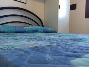 Posteľ alebo postele v izbe v ubytovaní Holiday home in Rosolina Mare 26701