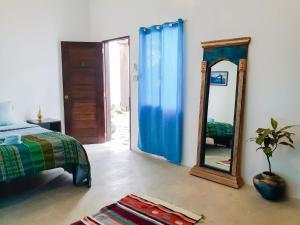 Säng eller sängar i ett rum på Riad Masaya