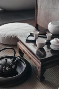 张家界宋风明雨精品民宿 (张家界国家森林公园武陵源店)房間的床