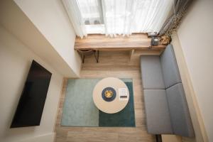 an overhead view of a room with a table and a window at Explore Hotel in Taichung +36 photos
