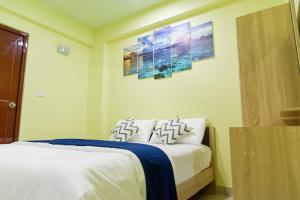 Postel nebo postele na pokoji v ubytování Tourist Inn