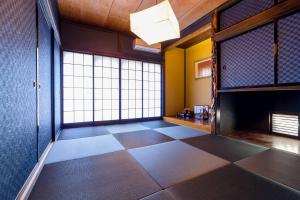 Tempat tidur dalam kamar di enico MtFuji nagomi和