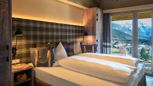 Posteľ alebo postele v izbe v ubytovaní Mountain Spa Residences
