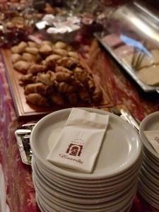 a table with plates of food on a table at Hotel Epavlis in Drama