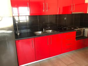 Kuchyň nebo kuchyňský kout v ubytování roomotel.com