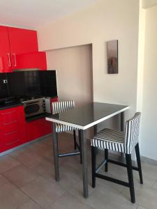 Kuchyň nebo kuchyňský kout v ubytování roomotel.com