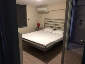 Postel nebo postele na pokoji v ubytování roomotel.com