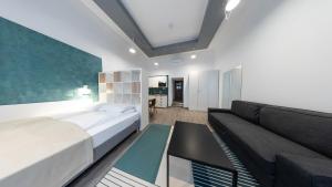 A kitchen or kitchenette at BpR Downtown Gemstone Apartments