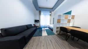 Posedenie v ubytovaní BpR Downtown Gemstone Apartments