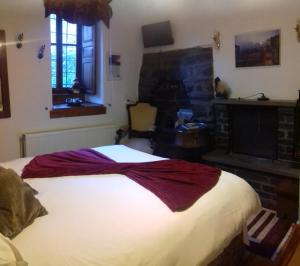 Postel nebo postele na pokoji v ubytování Traditional Rooms karaouli