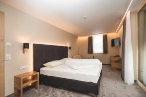 Posteľ alebo postele v izbe v ubytovaní Residenz Gramaser GmbH