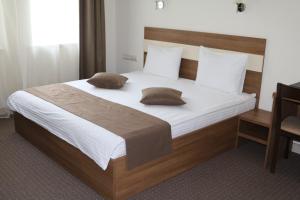 Postel nebo postele na pokoji v ubytování Smart Boutique Hotel Vitebsk