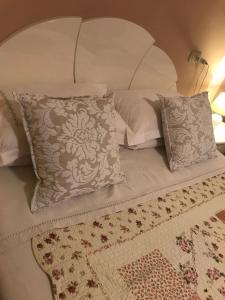 Uma cama ou camas num quarto em bebmanfredini