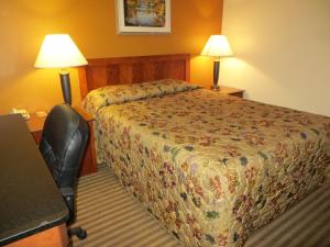 Postel nebo postele na pokoji v ubytování Portland Inn