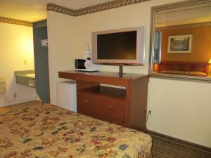 Postel nebo postele na pokoji v ubytování Portland Inn