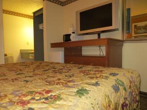 Postel nebo postele na pokoji v ubytování Portland Inn