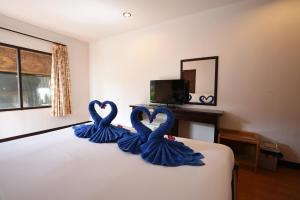 Katil atau katil-katil dalam bilik di Phi Phi Twin Palms Bungalow