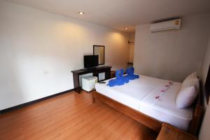 Katil atau katil-katil dalam bilik di Phi Phi Twin Palms Bungalow