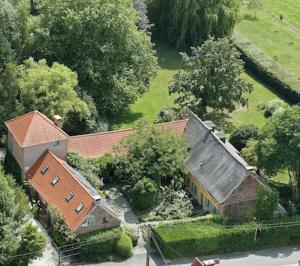 an aerial view of a house and trees at Holiday Home Les Plachettes in Flobecq