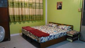 Letto o letti in una camera di The Kong