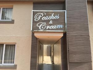 a store with a sign on the side of a building at Peaches & Cream Bed & Breakfast in Ladysmith