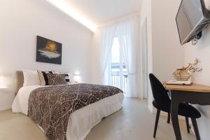 Posteľ alebo postele v izbe v ubytovaní A Misura Duomo Rooms & Apartment - LS Accommodations
