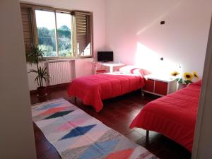 Postel nebo postele na pokoji v ubytování La Casa del Lago Pergusa Lake Home