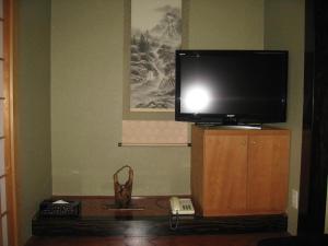 TV a/nebo společenská místnost v ubytování Hotel Kinu