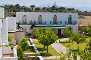 an image of a building with trees in front of it at Country Villas in Stelida