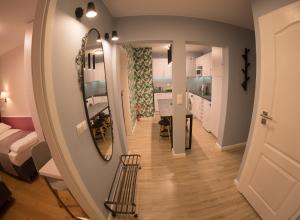 Posteľ alebo postele v izbe v ubytovaní Apartament Hotel Grzybowska 9