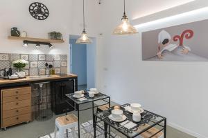 Dapur atau dapur kecil di A Misura Duomo Rooms & Apartment - LS Accommodations