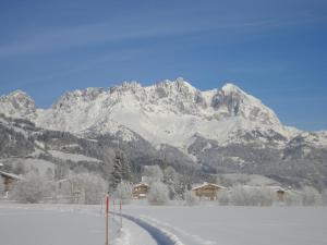 Apartment Hahnenkammblick að vetri til