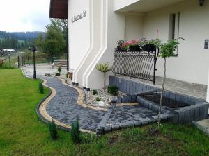 Vonkajšia záhrada v ubytovaní Apartament Hawrań Murzasichle Apartamenty Murzasichle PL