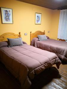 A bed or beds in a room at Casa Nueva