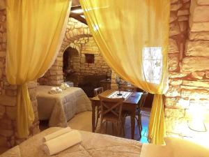 Posezení v ubytování Trulli Resort Dimore Storiche