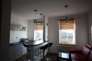 Kuchyňa alebo kuchynka v ubytovaní Apartament Rodzinny S7