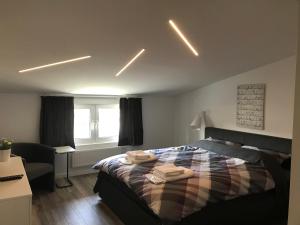 Postel nebo postele na pokoji v ubytování Grey apartment Zagreb