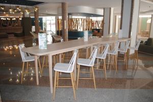 Ein Sitzbereich in der Unterkunft Gara Suites Golf & Spa