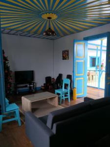 a living room with a couch and a table at Hotel Salento 1842 in Salento +14 photos