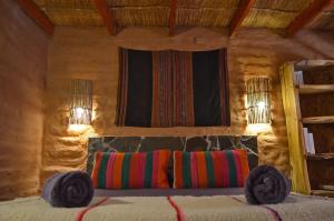 En eller flere senger på et rom på Ckuri Atacama
