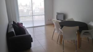 A television and/or entertainment centre at Aloha III - El Palomar B&D