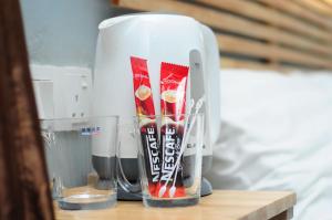 a blender sitting on top of a wooden table at HOTEL MESRA ALOR SETAR in Alor Setar